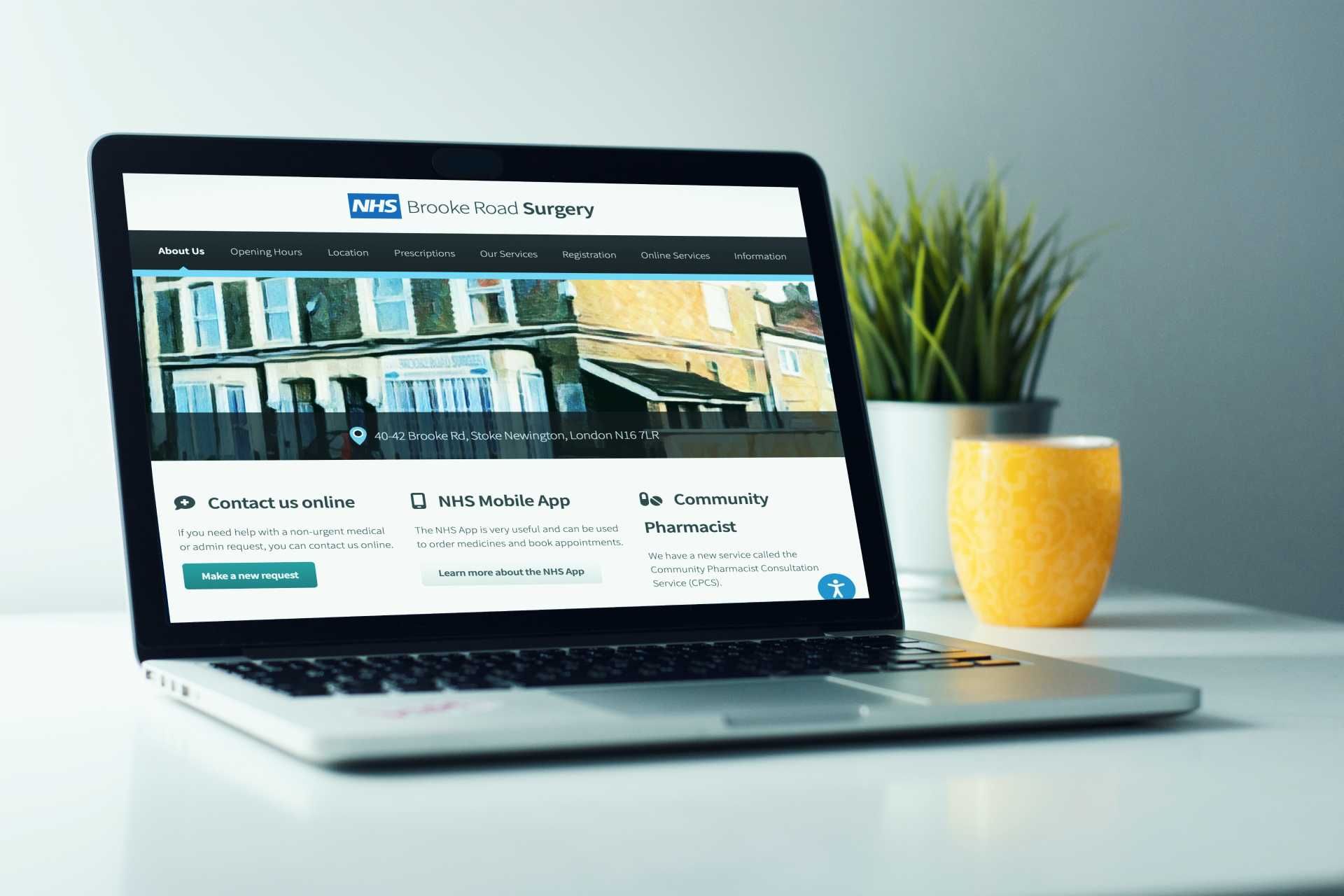 Brooke Road Surgery homepage shown on a laptop