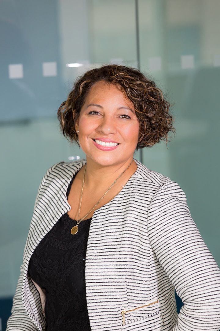 Professional woman smiling SisterLove, Inc, Nonprofit jobs atlanta, public health jobs Atlanta near me