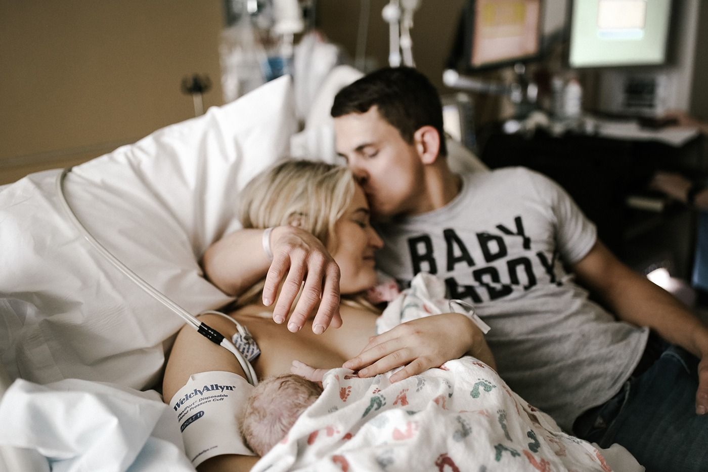 New parents in hospital or birthing center.